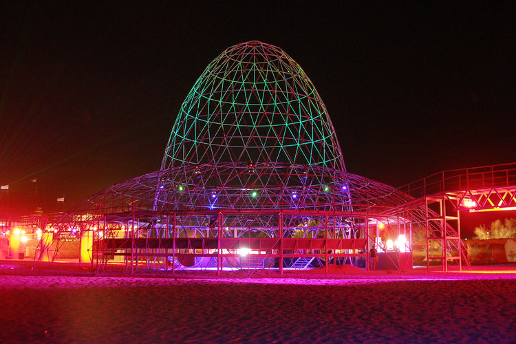 Techno dance floor lit red at night